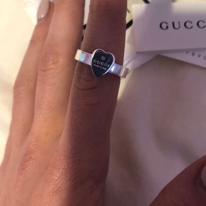 gucci heart ring on finger